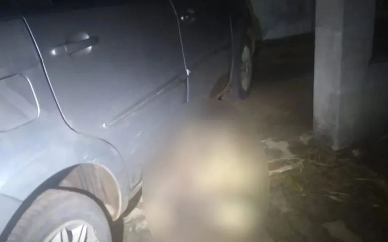 APÓS VIAGEM DE CARRO, MULHER ENCONTRA CORPO PRESO EMBAIXO DO VEÍCULO